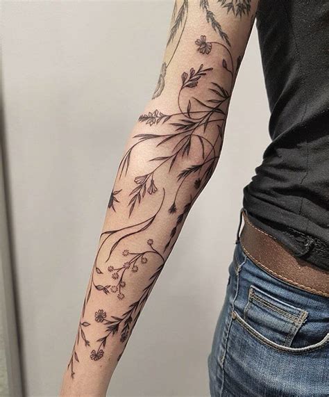 flowers on a vine tattoo|full body vine tattoo.